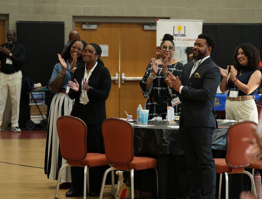 Participants standing and applauding at the 2026 AzABSE Teacher Leadership Summit
